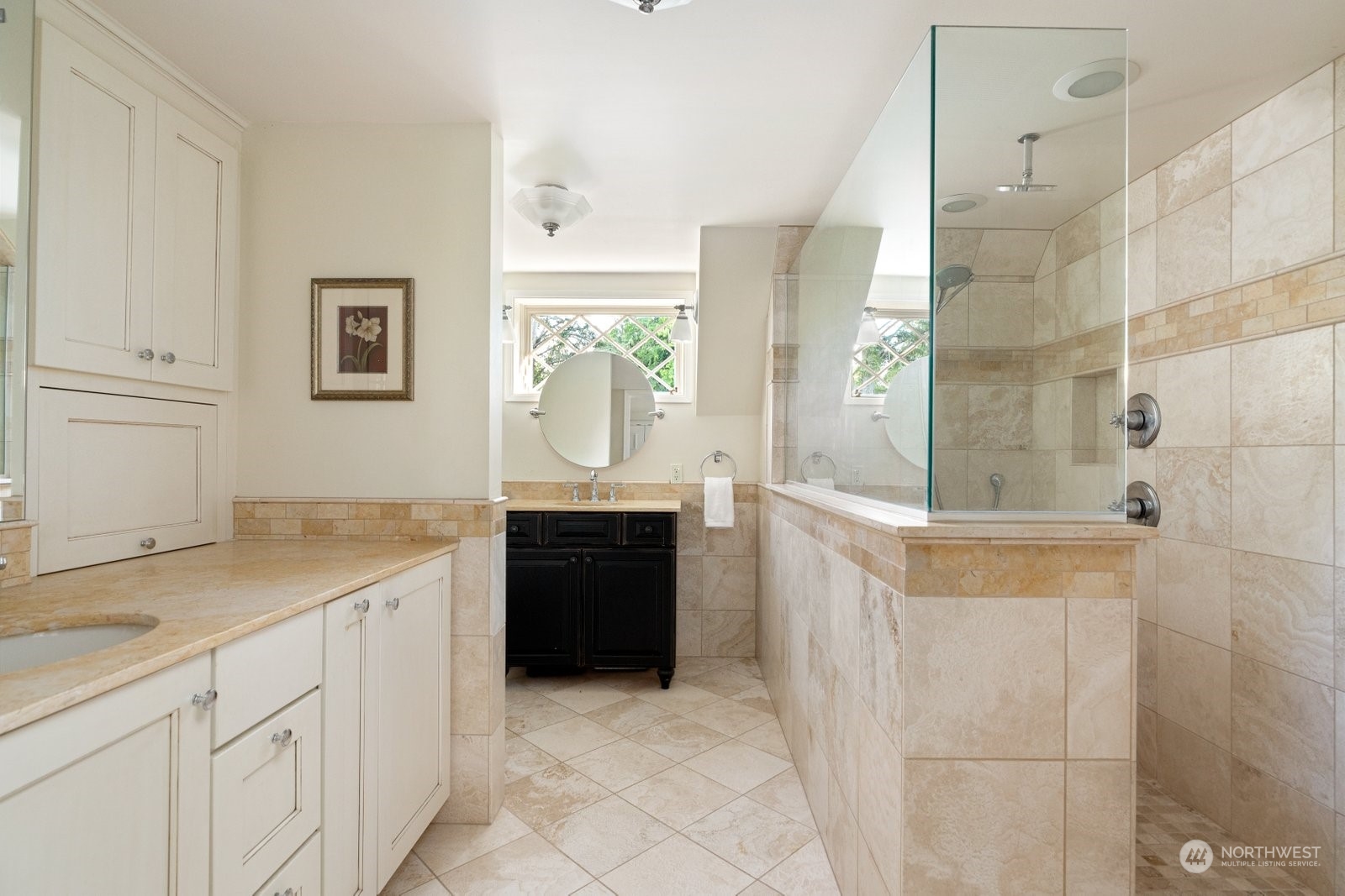 15253 Josh Wilson Road Burlington, WA 98233 - Photo 18 of 40 a spacious bathroom with a granite countertop sink a mirror and a bathtub