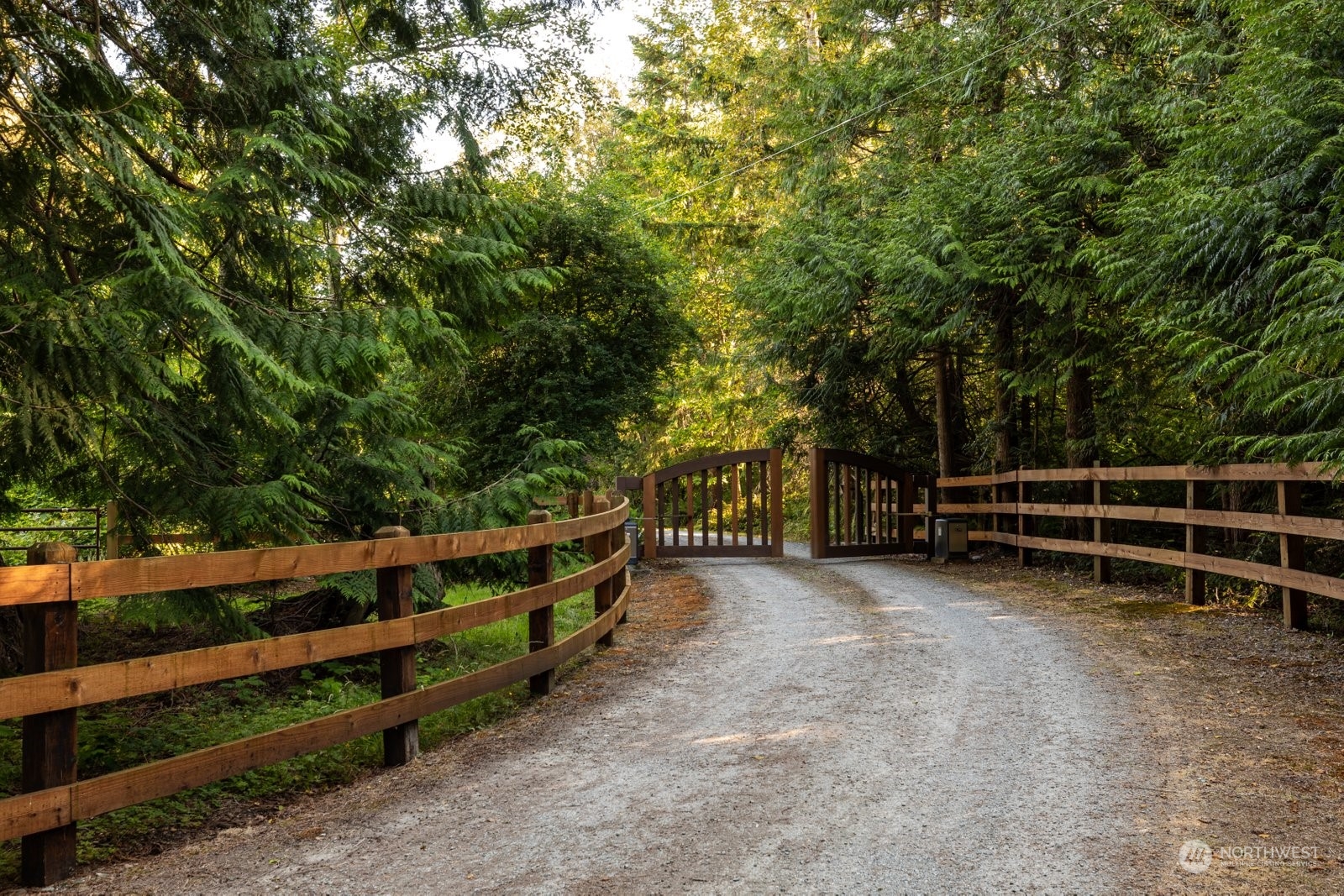 15253 Josh Wilson Road Burlington, WA 98233 - Photo 2 of 40 a view of a bench with wooden fence