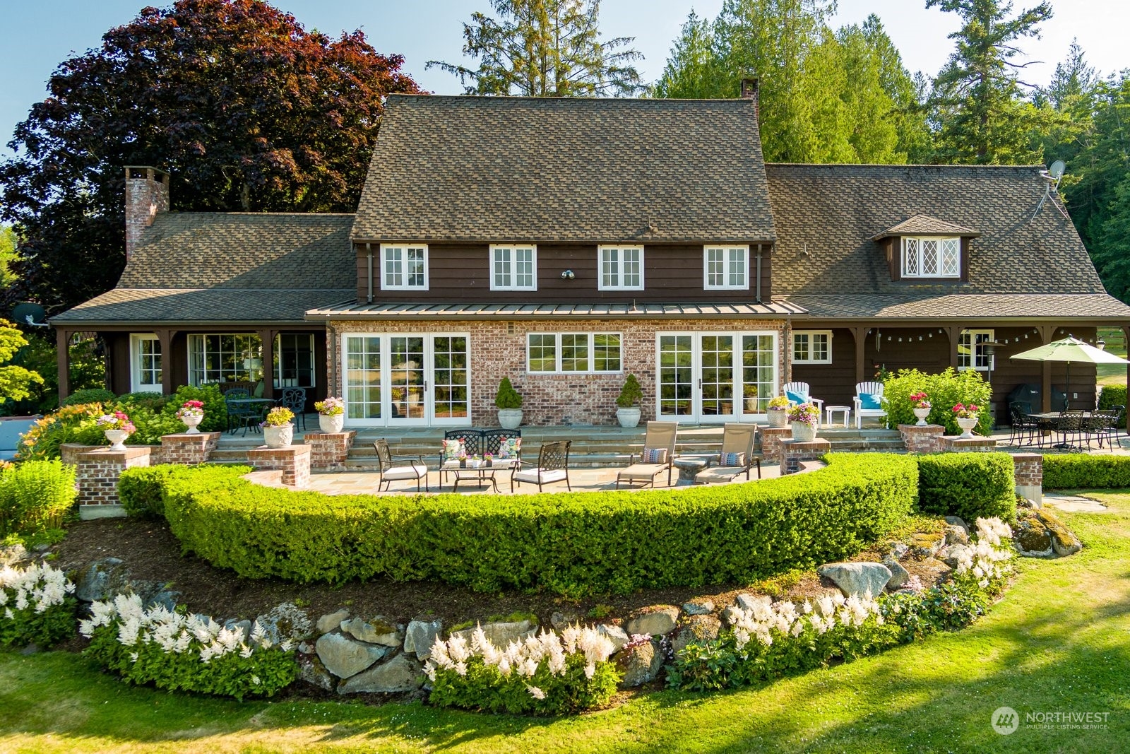 15253 Josh Wilson Road Burlington, WA 98233 - Photo 23 of 40 a view of a house with swimming pool and porch with furniture