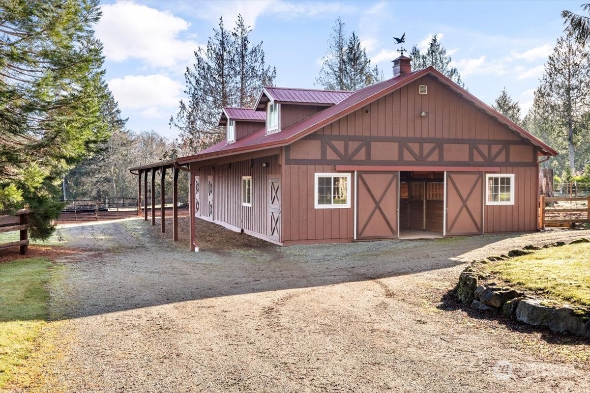 15253 Josh Wilson Road Burlington, WA 98233 - Photo 28 of 40 a front view of a house with a yard