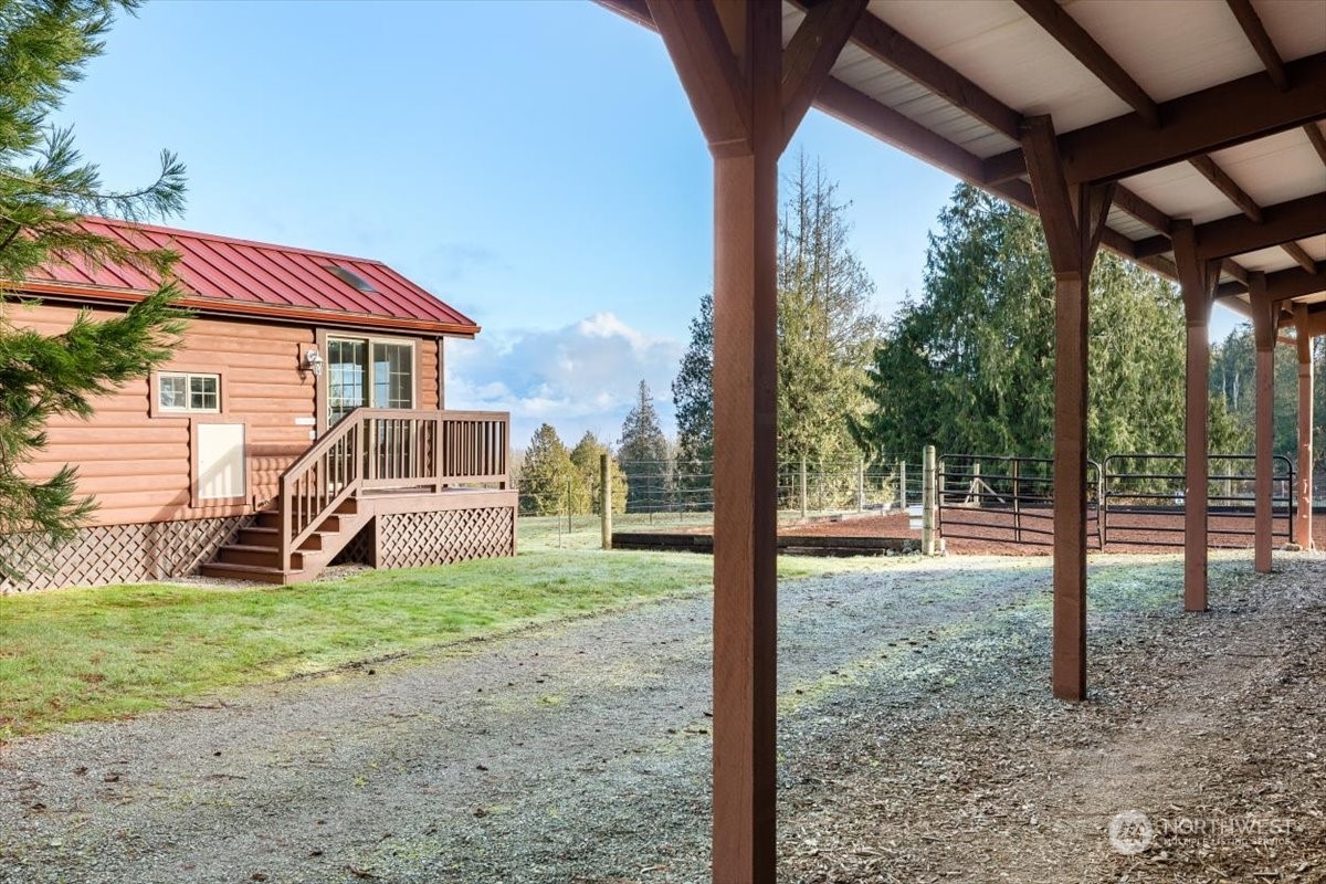15253 Josh Wilson Road Burlington, WA 98233 - Photo 29 of 40 a view of a house with backyard and a tree