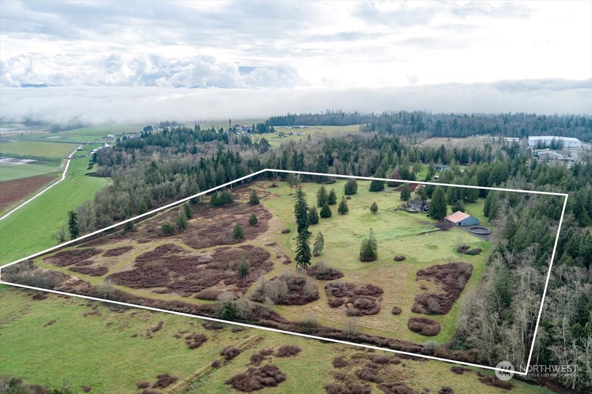 15253 Josh Wilson Road Burlington, WA 98233 - Photo 3 of 40 a view of a swimming pool with a balcony