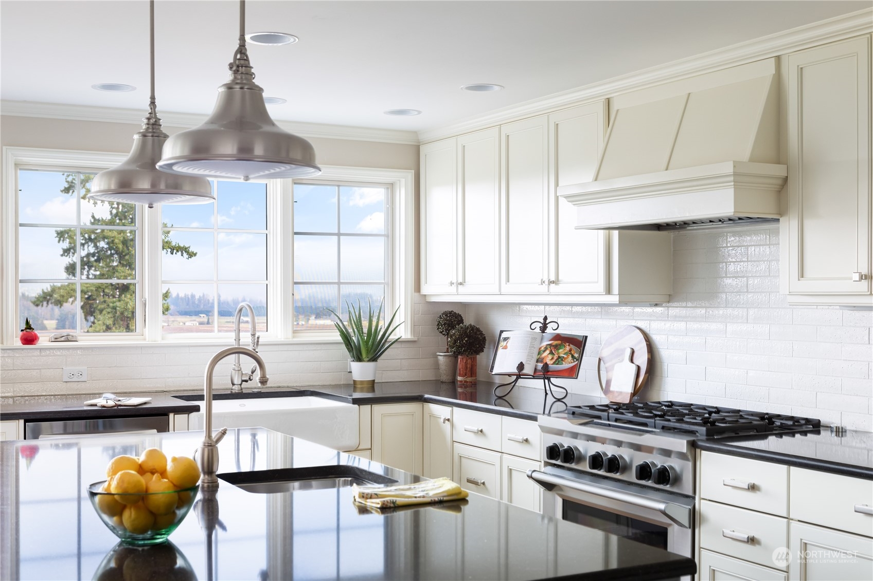 15253 Josh Wilson Road Burlington, WA 98233 - Photo 9 of 40 a kitchen with stainless steel appliances granite countertop a stove a sink and a cabinets