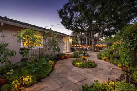 a view of garden with patio