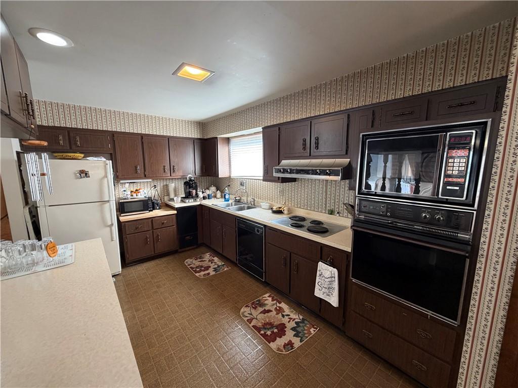 149 Chess Street Monongahela, PA 15063 - Photo 10 of 35 a kitchen with kitchen island wooden cabinets and stainless steel appliances