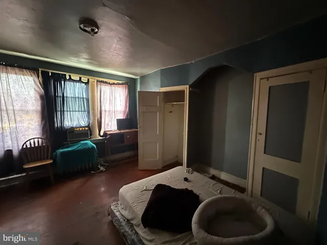 a room with furniture and a window