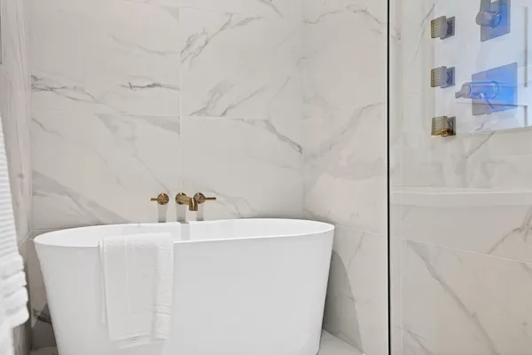 a bathroom with a sink a mirror and vanity
