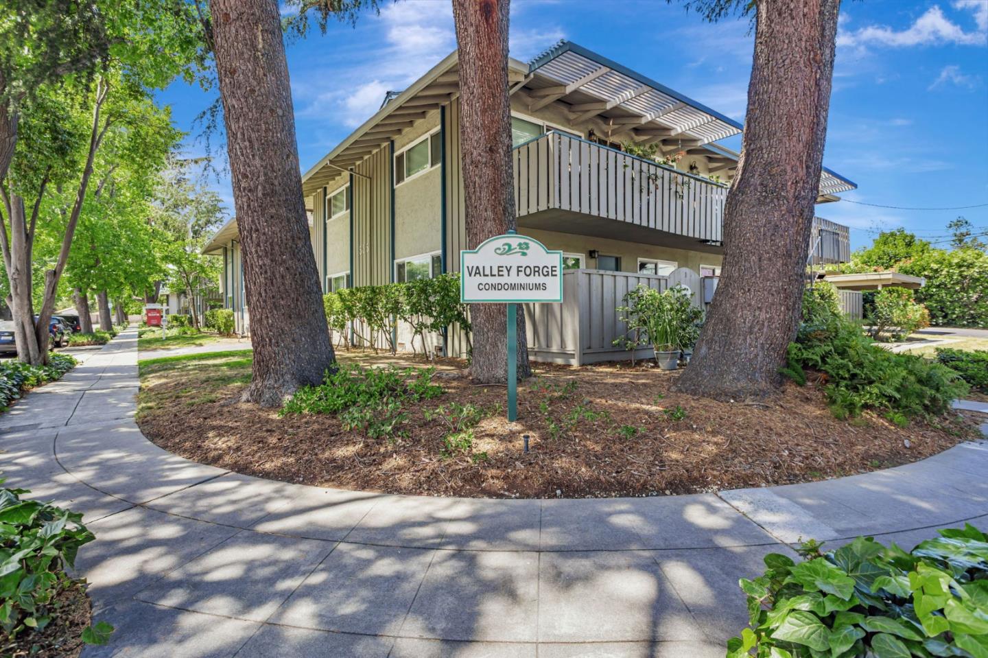 561 Valley Forge Way, Unit 4 Campbell, CA 95117 - Photo 1 of 1 a view of a pathway with a fountain in the patio
