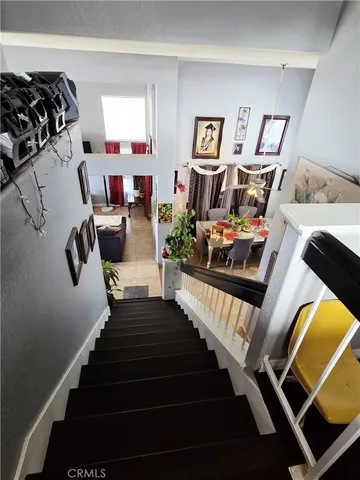 a view of a living room and dining room