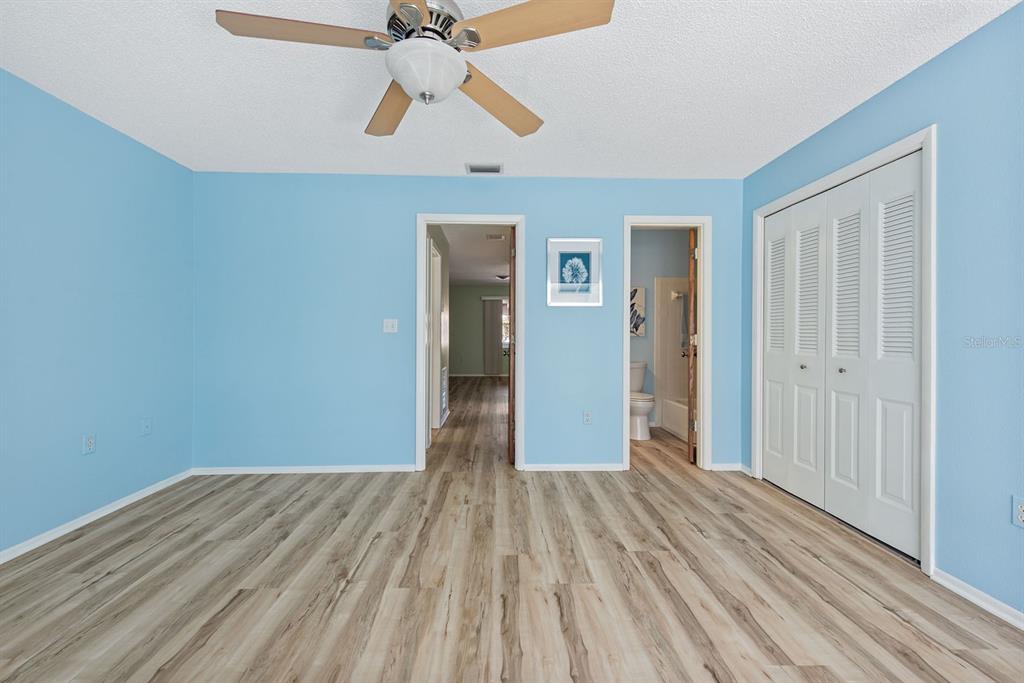 9 Quails Run Boulevard, Unit 9 Englewood, FL 34223 - Photo 17 of 42 a view of empty room with wooden floor