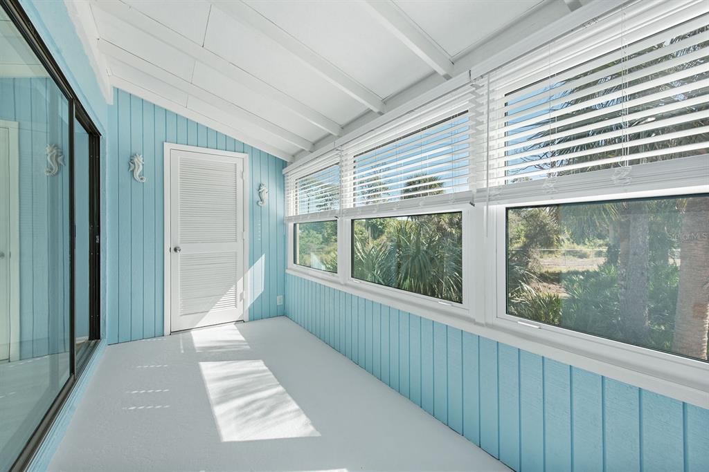 9 Quails Run Boulevard, Unit 9 Englewood, FL 34223 - Photo 24 of 42 a view of a room with a large window