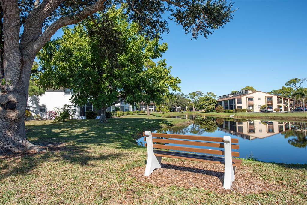 9 Quails Run Boulevard, Unit 9 Englewood, FL 34223 - Photo 36 of 42 a view of a lake view