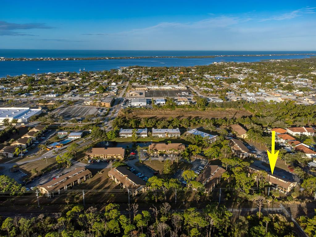 9 Quails Run Boulevard, Unit 9 Englewood, FL 34223 - Photo 41 of 42 an aerial view of residential building and ocean