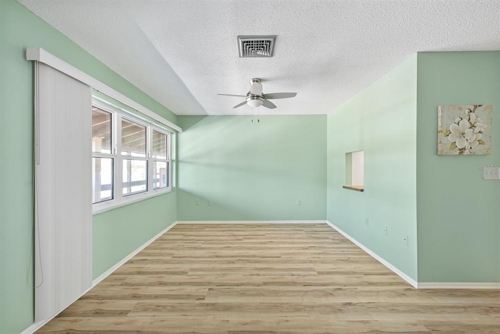 9 Quails Run Boulevard, Unit 9 Englewood, FL 34223 - Photo 5 of 42 a bedroom with a bed and a window