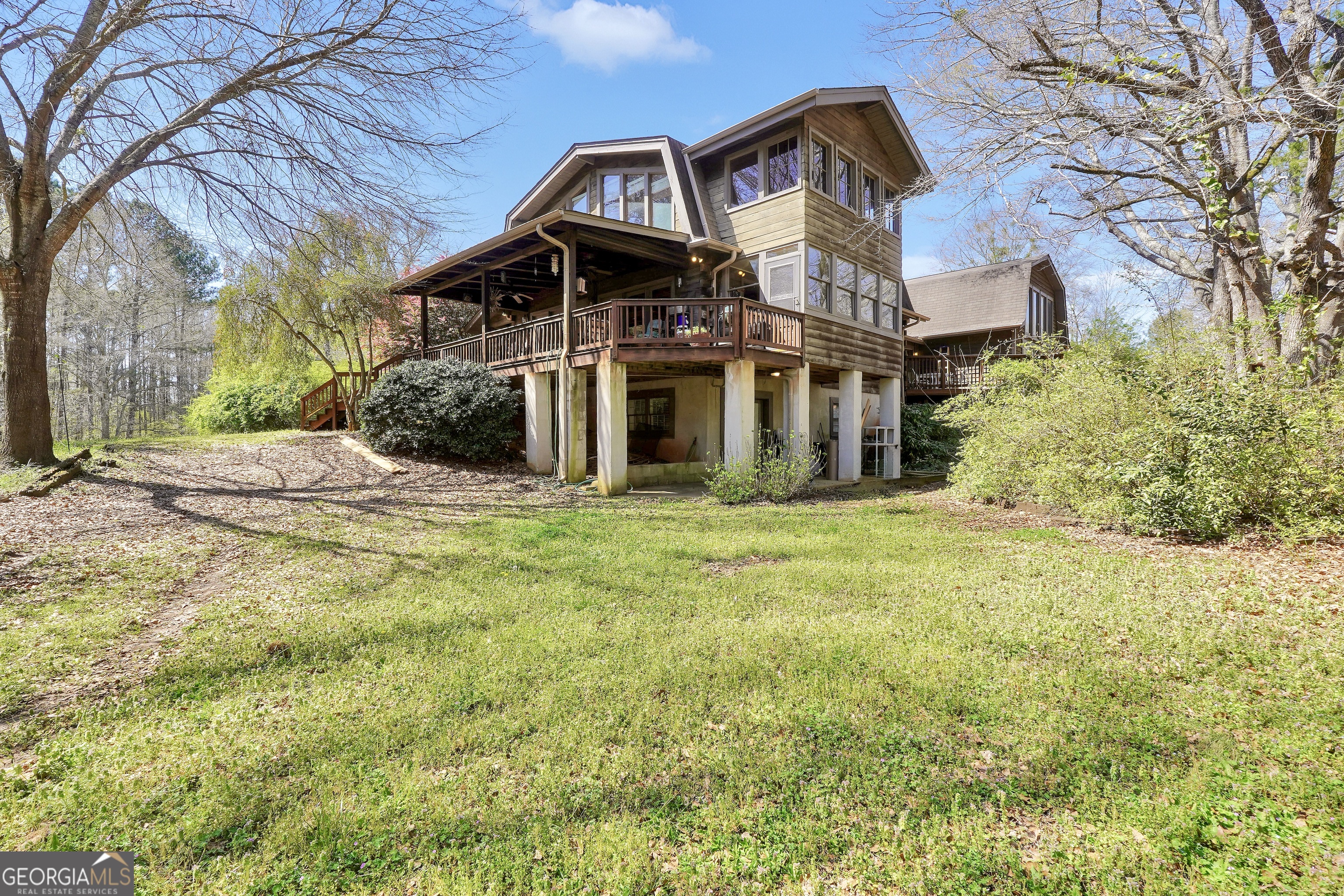 330 Country Kitchen Road Barnesville, GA 30204 - Photo 13 of 64 a front view of a house with a garden