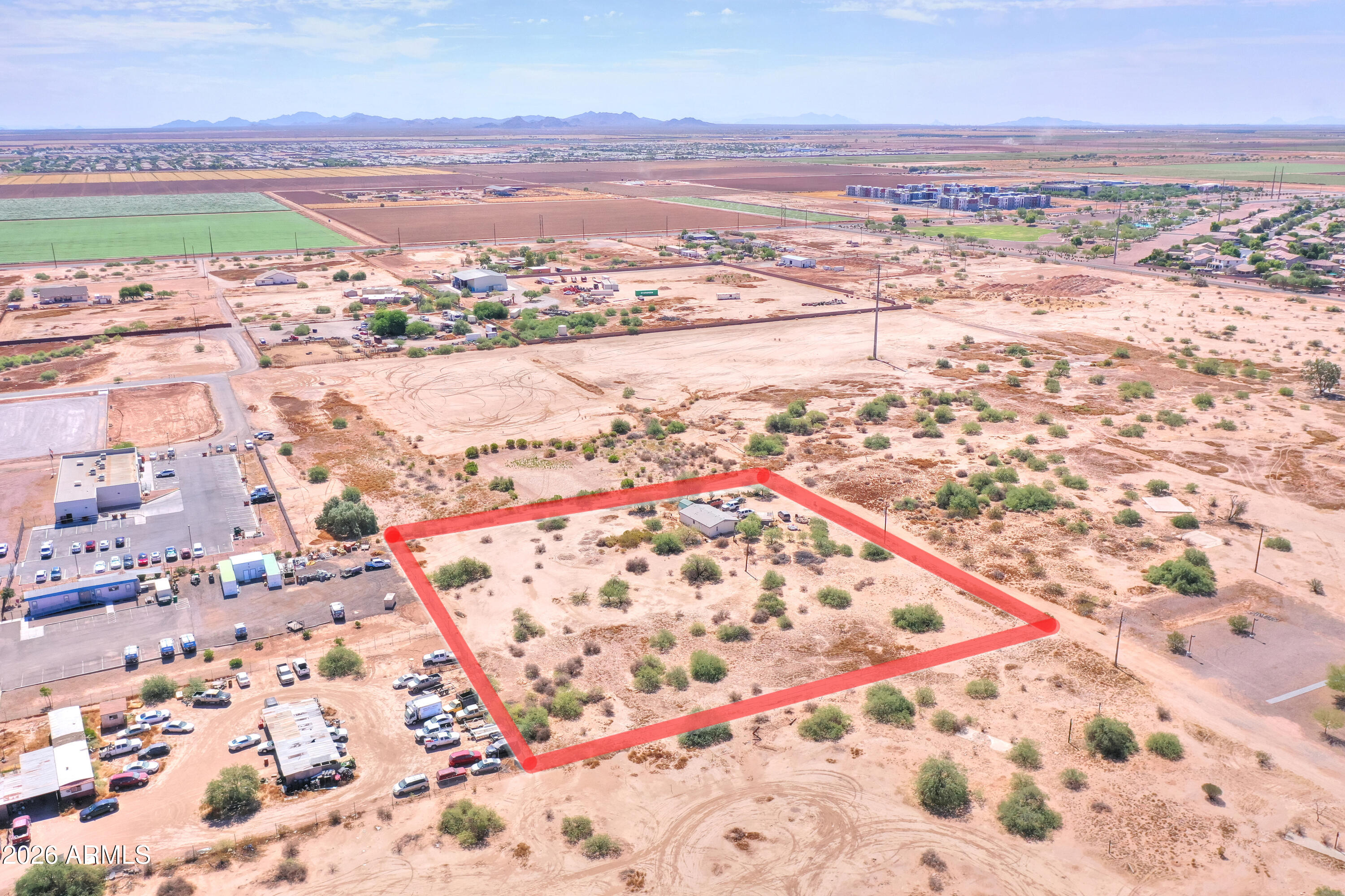 40526 West 7 Ranch Road Maricopa, AZ 85138 - Photo 3 of 14 an aerial view of residential houses with outdoor space