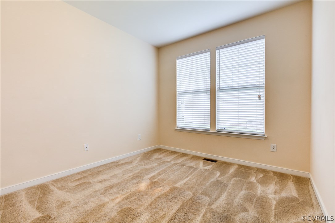 14513 Needham Market Road Midlothian, VA 23112 - Photo 15 of 31 a view of an empty room with a window