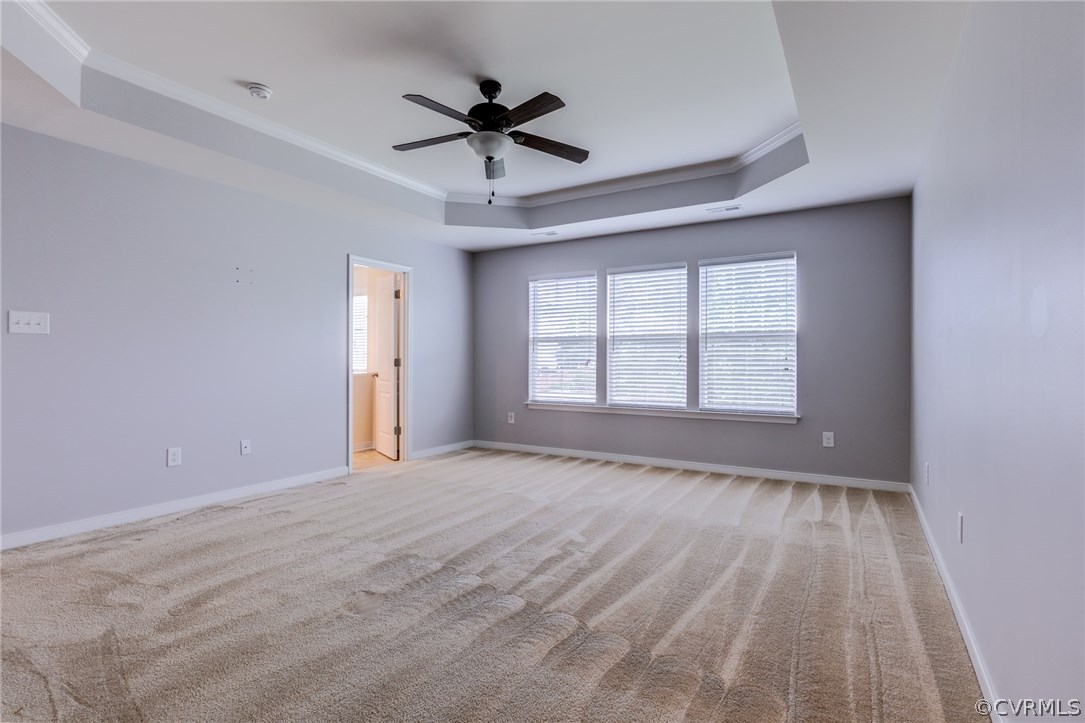 14513 Needham Market Road Midlothian, VA 23112 - Photo 21 of 31 a view of an empty room with a window and a kitchen