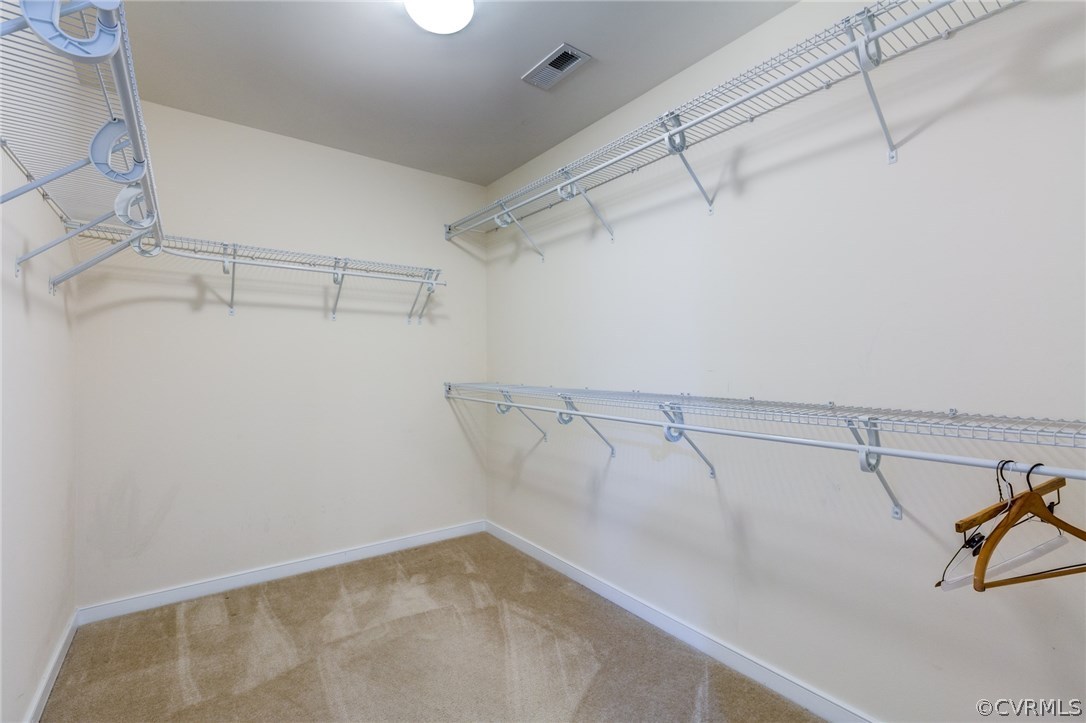 14513 Needham Market Road Midlothian, VA 23112 - Photo 24 of 31 a view of a room with racks on the wall