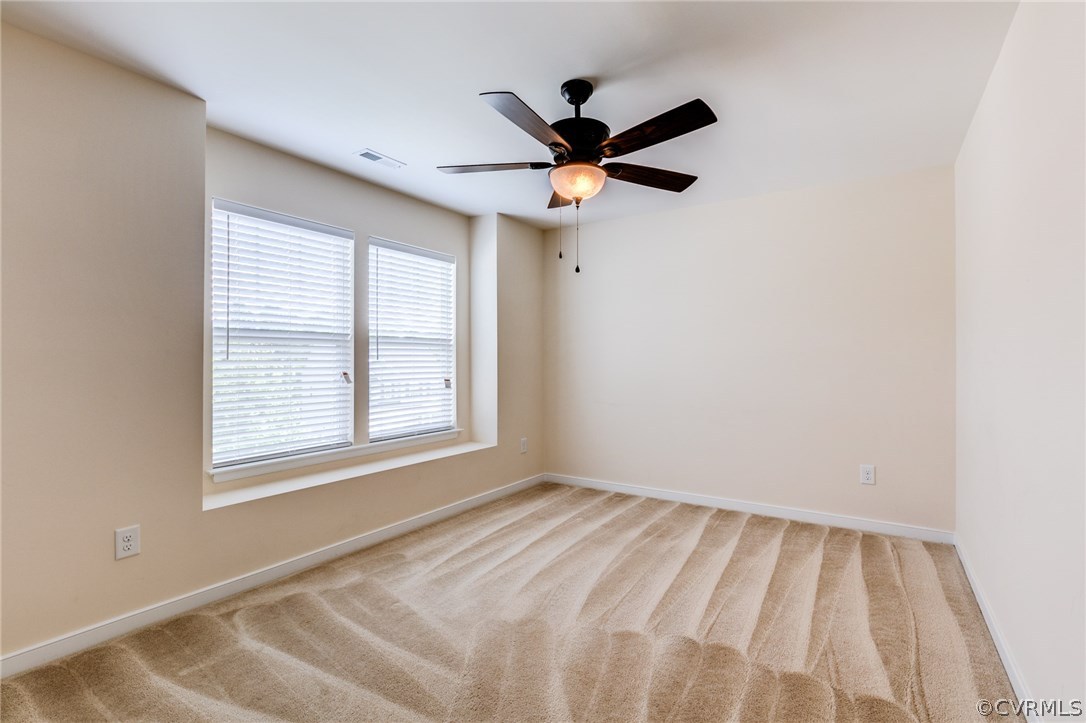 14513 Needham Market Road Midlothian, VA 23112 - Photo 25 of 31 a view of an empty room with a window