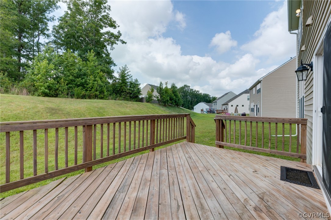 14513 Needham Market Road Midlothian, VA 23112 - Photo 26 of 31 a balcony with view of trees in the background