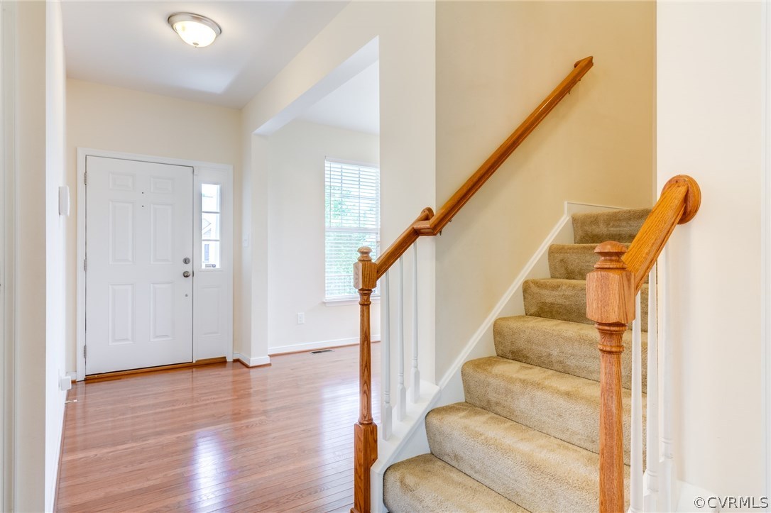 14513 Needham Market Road Midlothian, VA 23112 - Photo 8 of 31 a view of entryway with wooden floor and stairs
