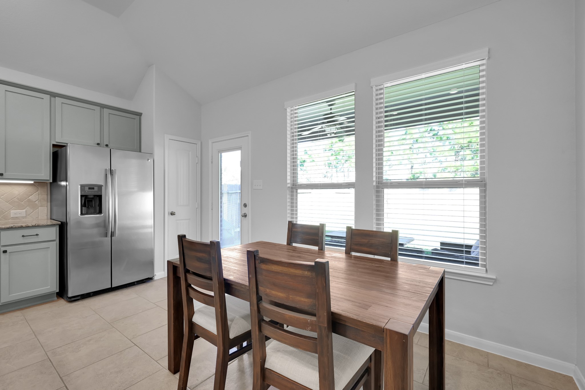 31851 Chapel Rock Lane Spring, TX 77386 - Photo 15 of 50 a dining room with furniture and window