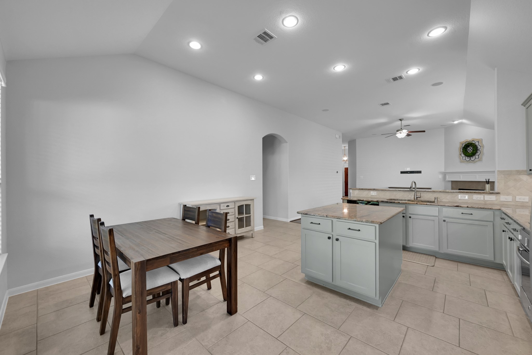 31851 Chapel Rock Lane Spring, TX 77386 - Photo 17 of 50 a kitchen with a table and chairs in it