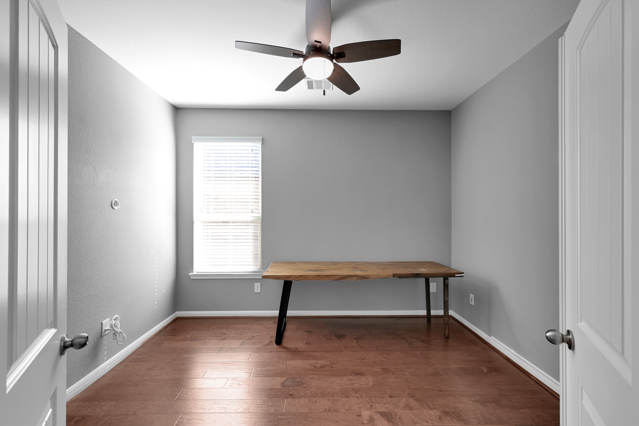31851 Chapel Rock Lane Spring, TX 77386 - Photo 23 of 50 a view of an empty room with window and a ceiling fan