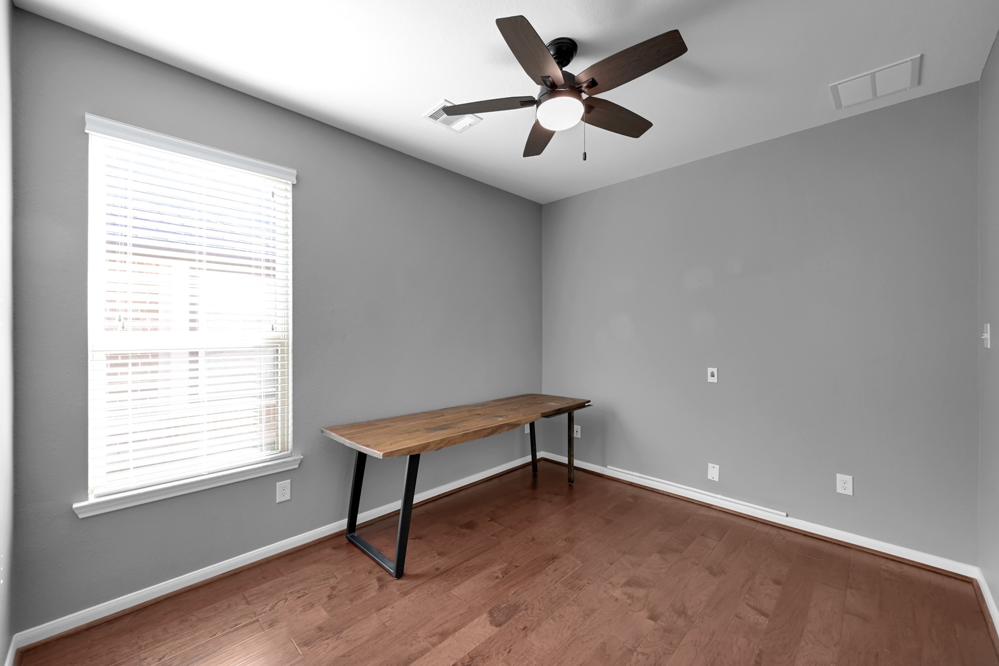 31851 Chapel Rock Lane Spring, TX 77386 - Photo 24 of 50 an empty room with a window and a fan