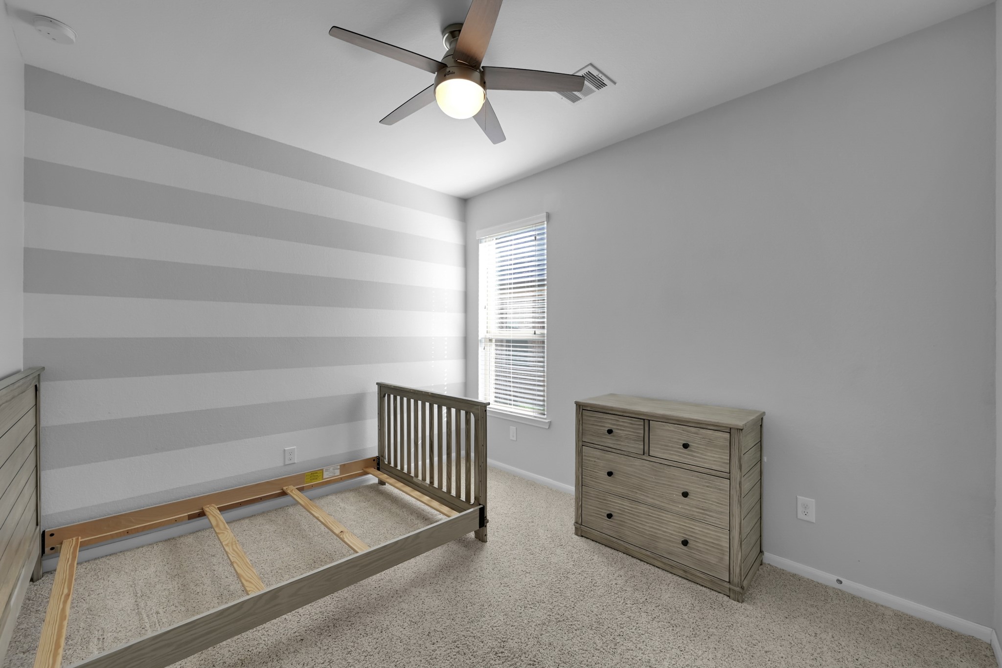 31851 Chapel Rock Lane Spring, TX 77386 - Photo 26 of 50 wooden floor in an empty room with a window