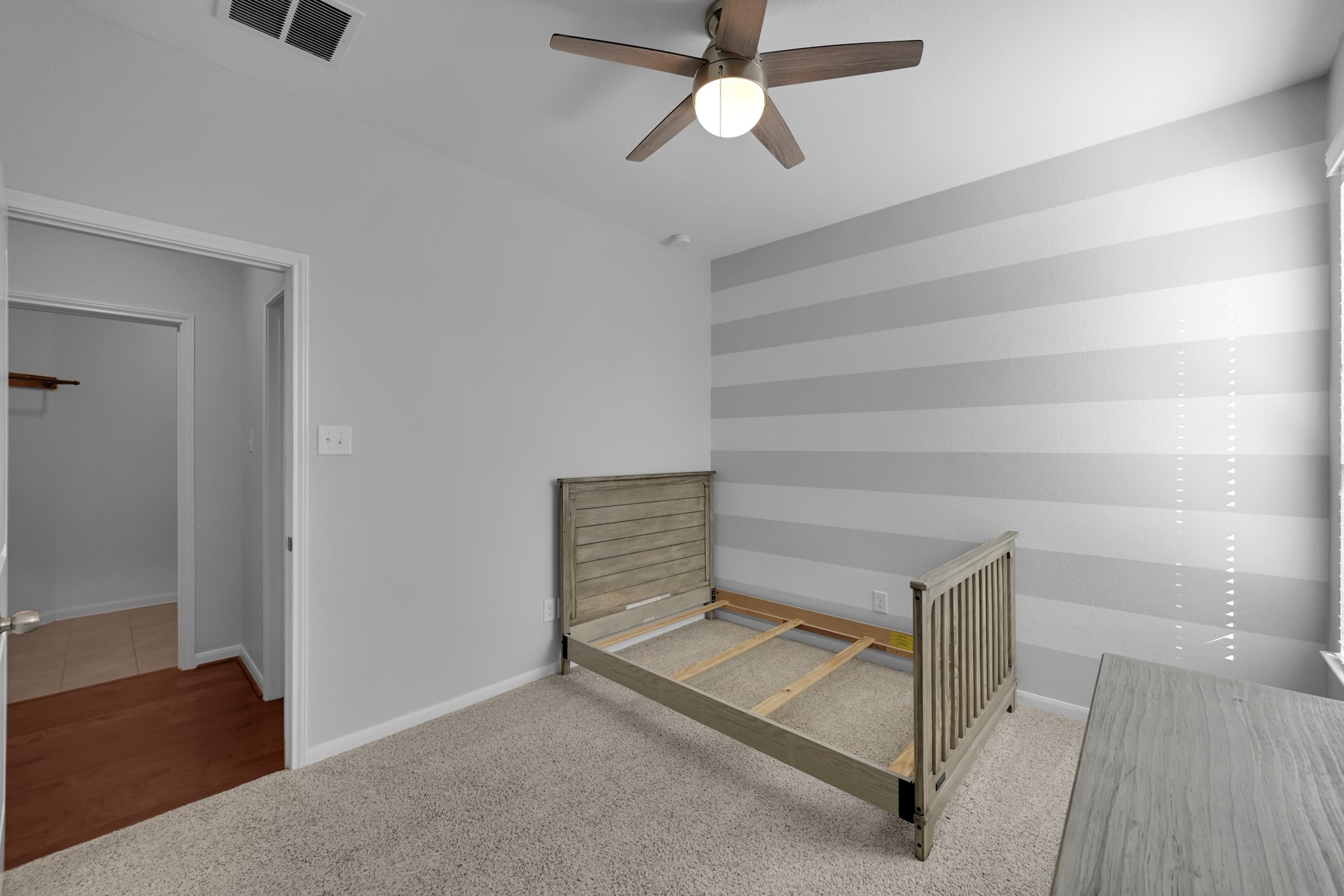 31851 Chapel Rock Lane Spring, TX 77386 - Photo 27 of 50 a living room with a furniture and a ceiling fan