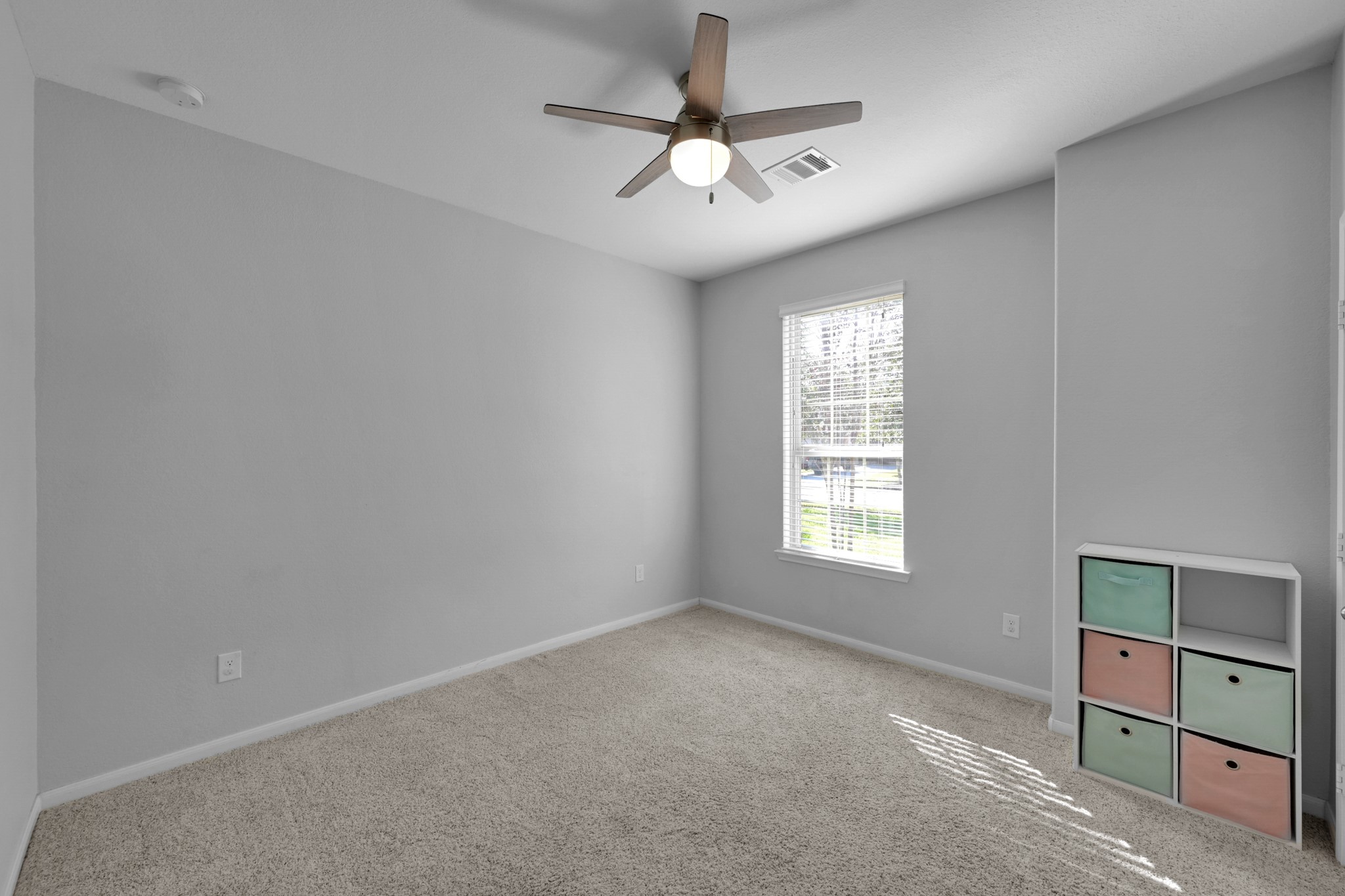 31851 Chapel Rock Lane Spring, TX 77386 - Photo 31 of 50 a view of a livingroom with a ceiling fan and window