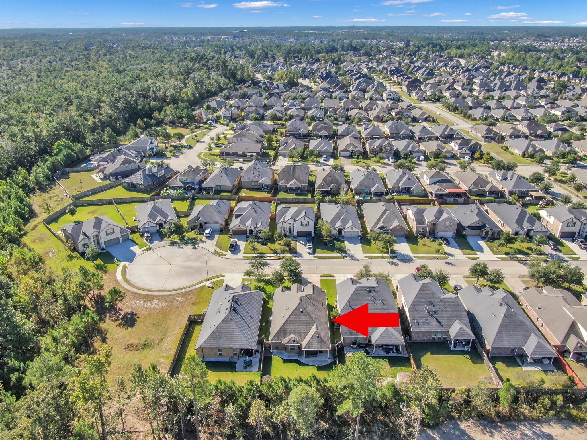31851 Chapel Rock Lane Spring, TX 77386 - Photo 43 of 50 an aerial view of residential houses with outdoor space and swimming pool