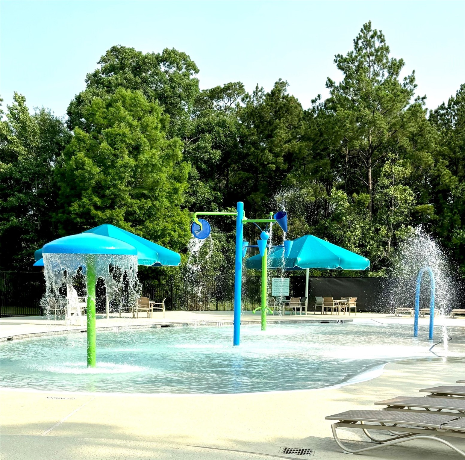 31851 Chapel Rock Lane Spring, TX 77386 - Photo 49 of 50 a swimming pool with outdoor seating and yard