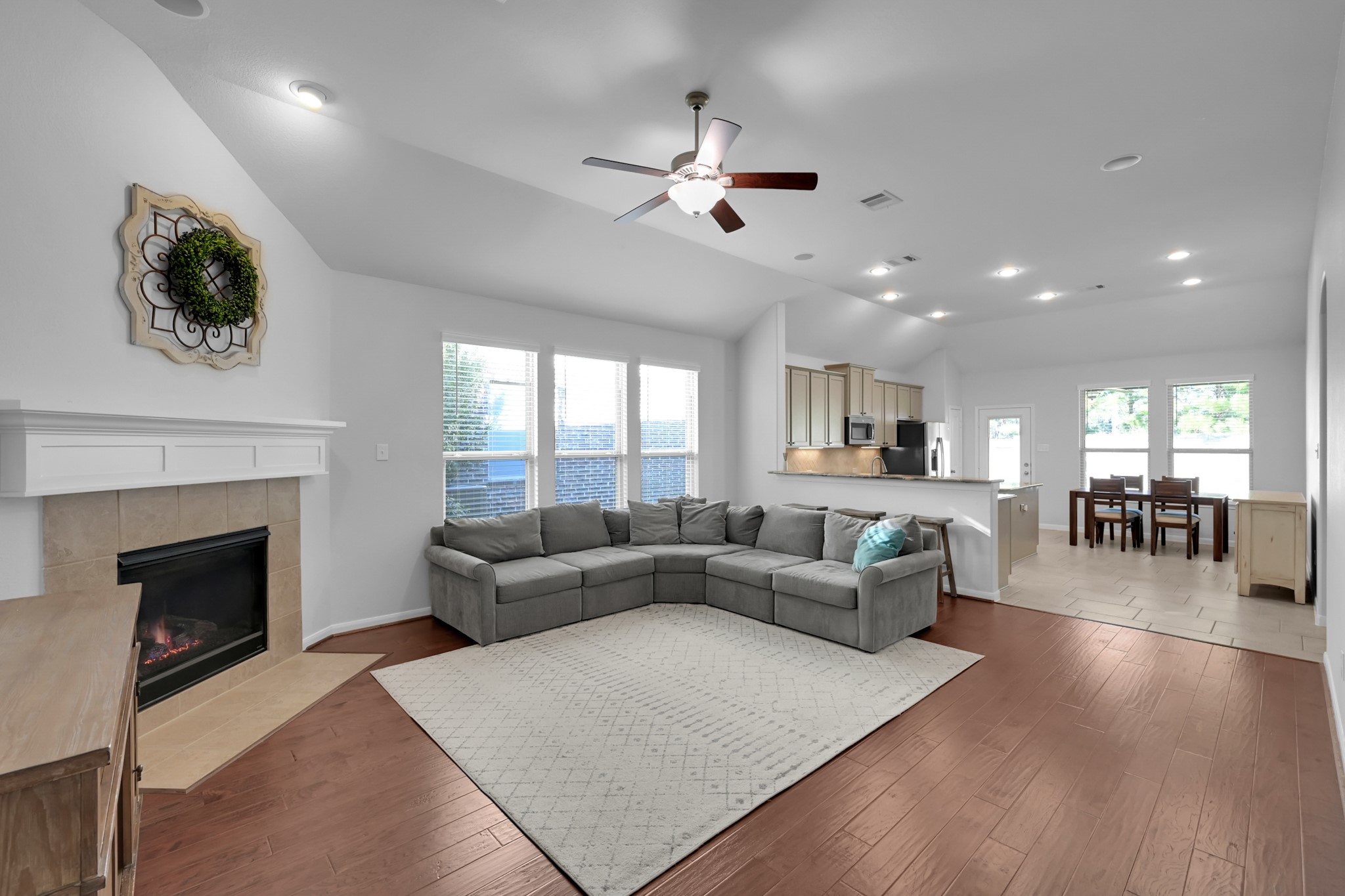 31851 Chapel Rock Lane Spring, TX 77386 - Photo 5 of 50 a living room with furniture and a fireplace