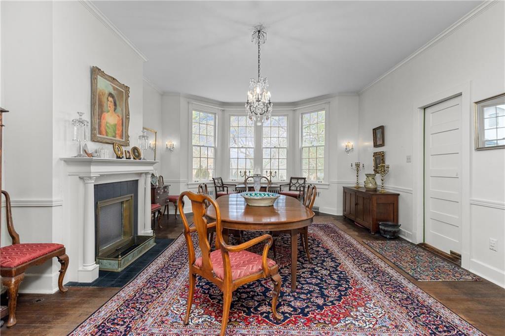 804 Persimmon Road Sewickley, PA 15143 - Photo 11 of 43 a dining room with furniture window and wooden floor