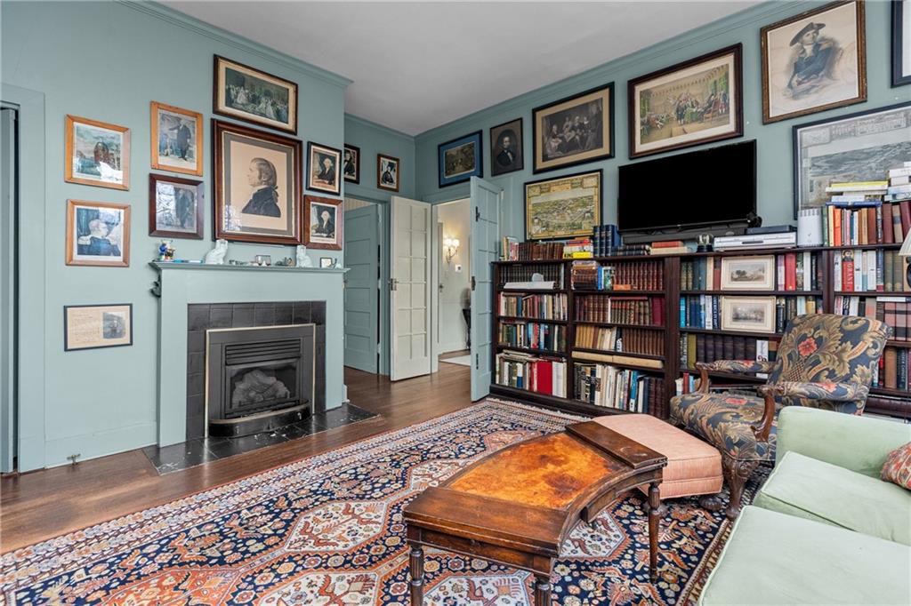 804 Persimmon Road Sewickley, PA 15143 - Photo 15 of 43 a living room with fireplace furniture and a flat screen tv