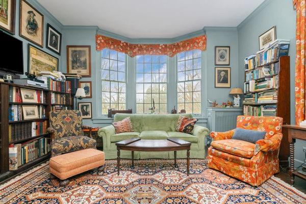 804 Persimmon Road Sewickley, PA 15143 - Photo 16 of 43 a living room with furniture a bookshelf and a window