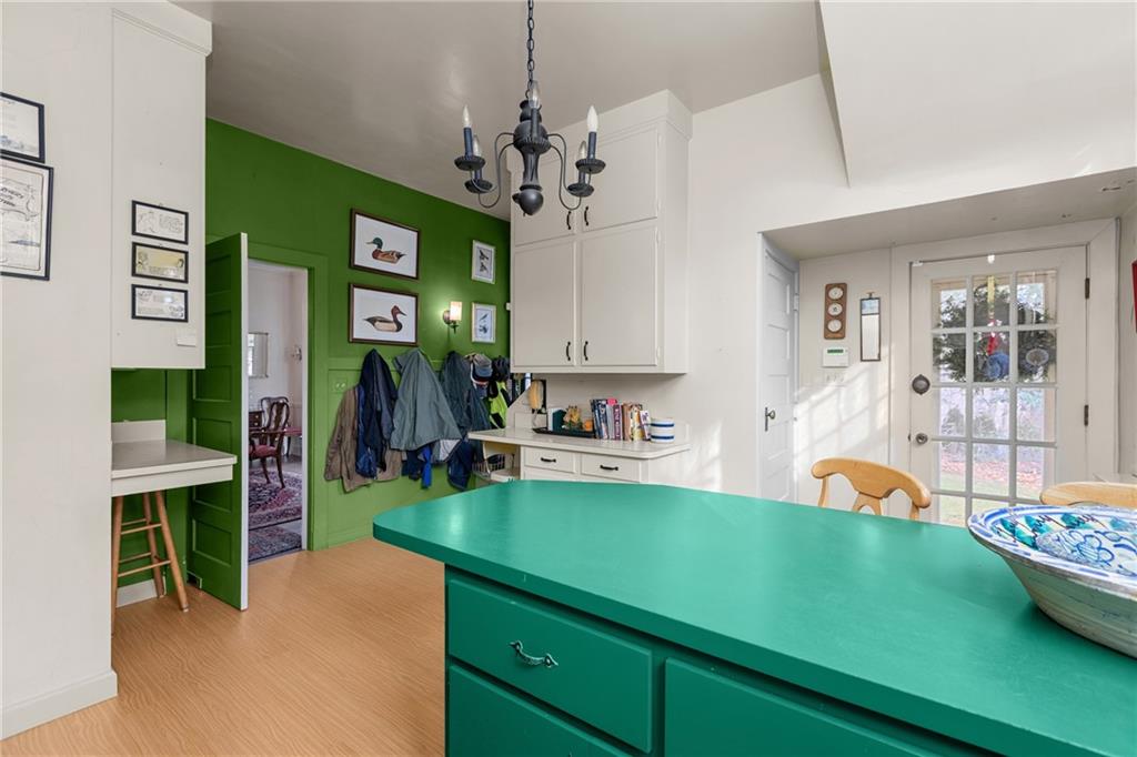 804 Persimmon Road Sewickley, PA 15143 - Photo 19 of 43 a living room with furniture and a chandelier