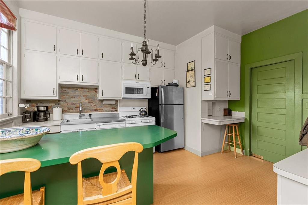 804 Persimmon Road Sewickley, PA 15143 - Photo 20 of 43 a kitchen with refrigerator and cabinets