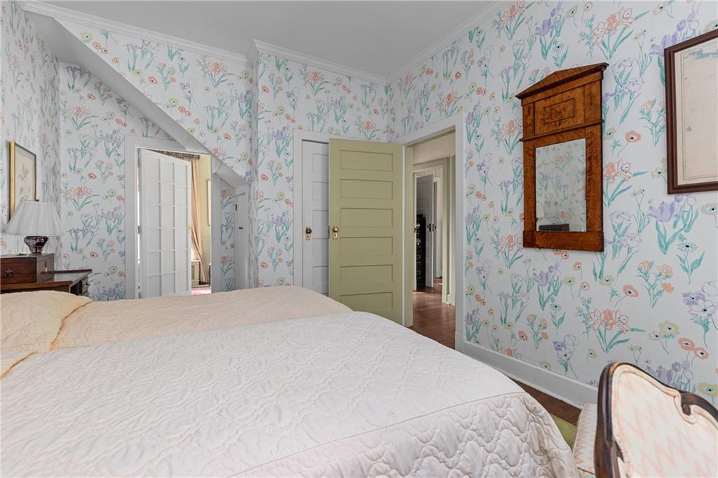 804 Persimmon Road Sewickley, PA 15143 - Photo 24 of 43 a bedroom with a bed and a dresser