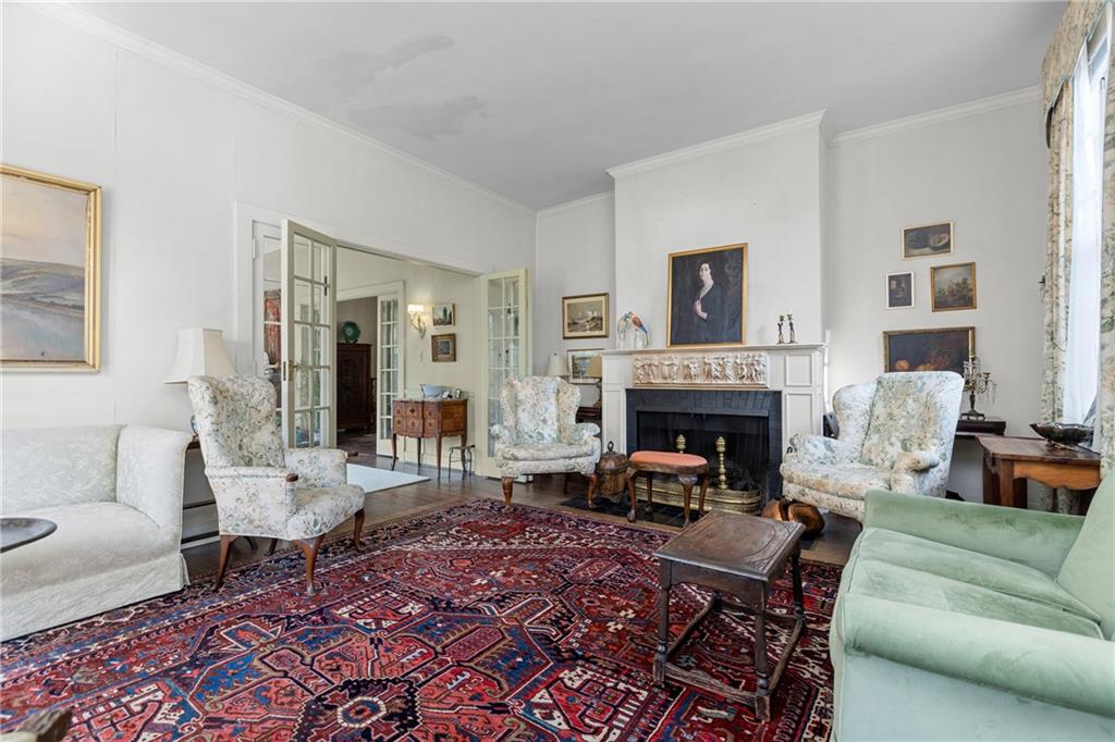 804 Persimmon Road Sewickley, PA 15143 - Photo 8 of 43 a living room with furniture and a fireplace
