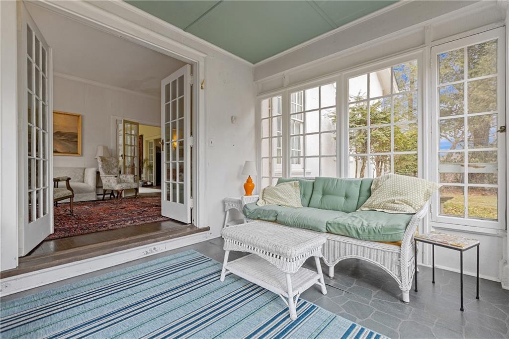 804 Persimmon Road Sewickley, PA 15143 - Photo 9 of 43 a living room with furniture and a floor to ceiling window