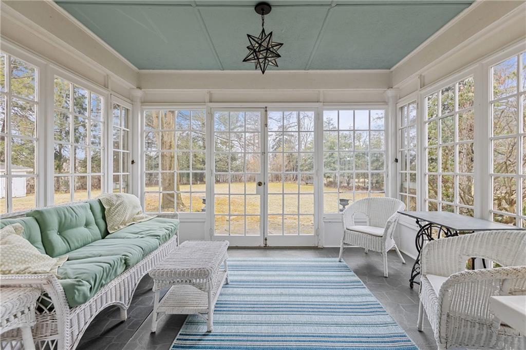 804 Persimmon Road Sewickley, PA 15143 - Photo 10 of 43 a living room with furniture and floor to ceiling windows