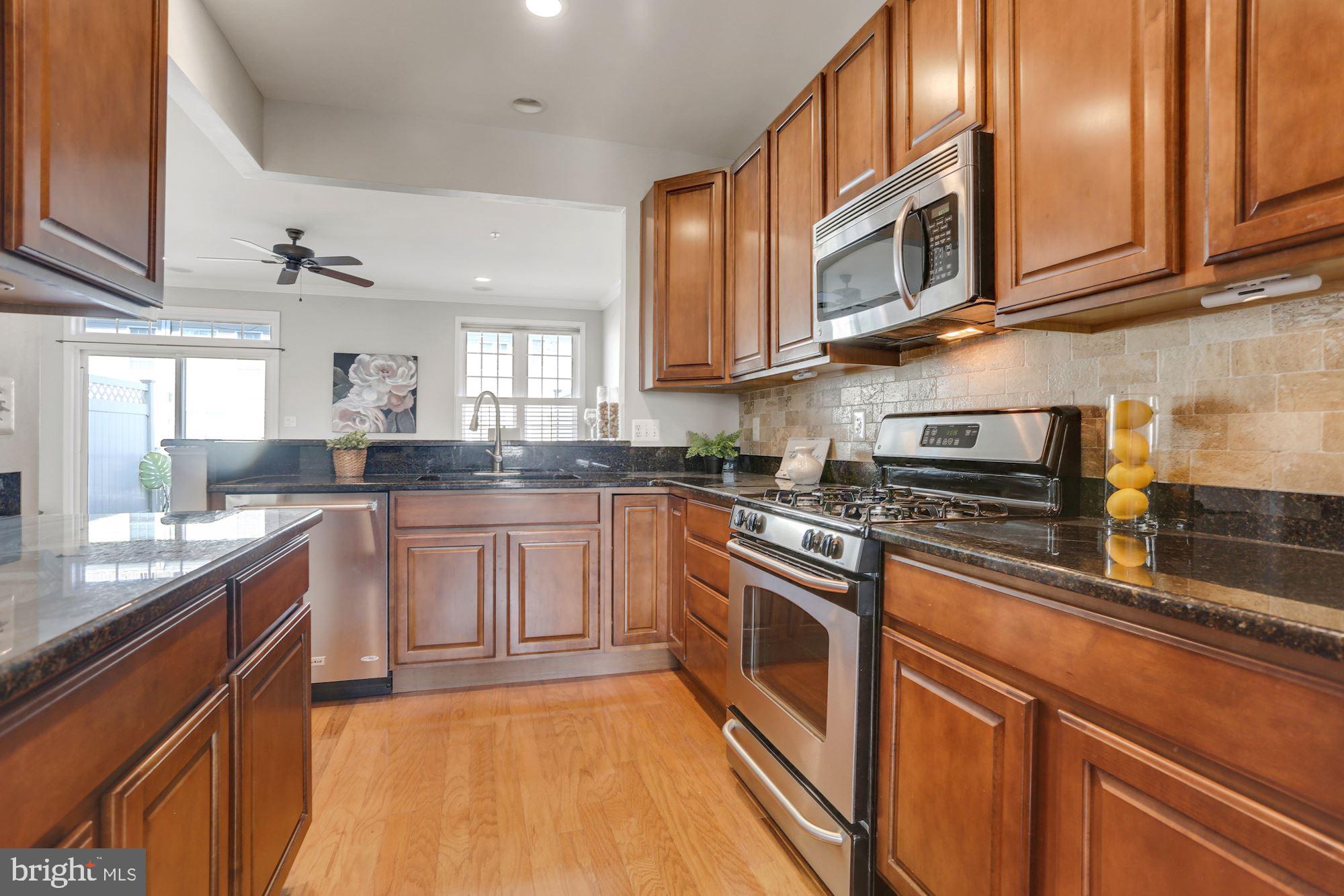 1334 Decatur Street Baltimore, MD 21230 - Photo 17 of 83 Maple Cabinetry & ENERGY STAR Stainless Steel Appl