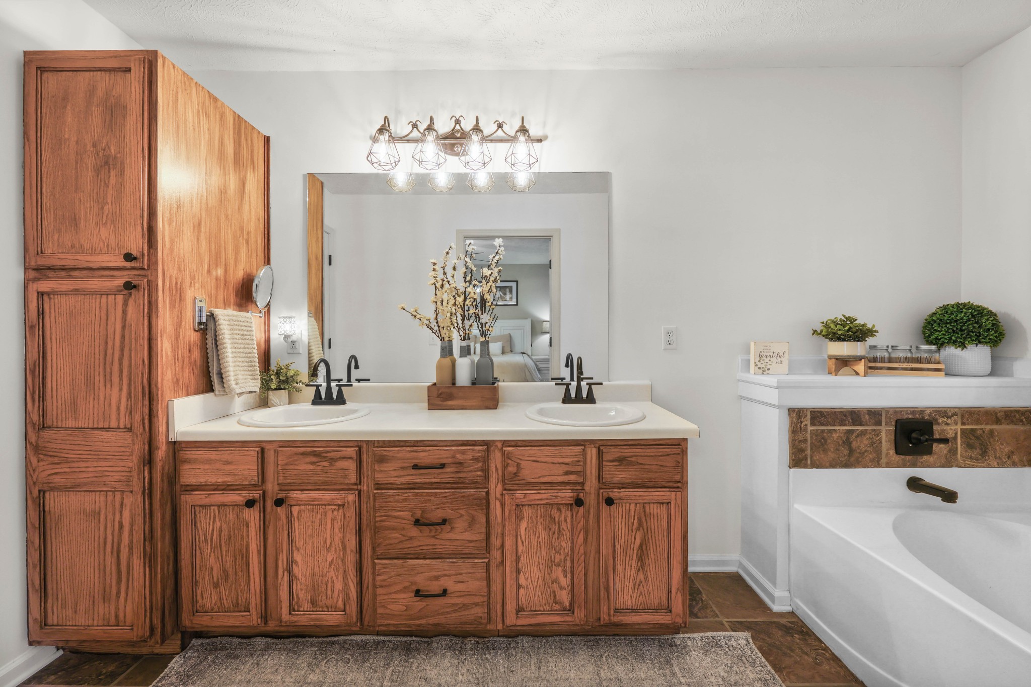 1201 Gallion Road Cumberland Furnace, TN 37051 - Photo 17 of 29 a bathroom with a tub sink and mirror