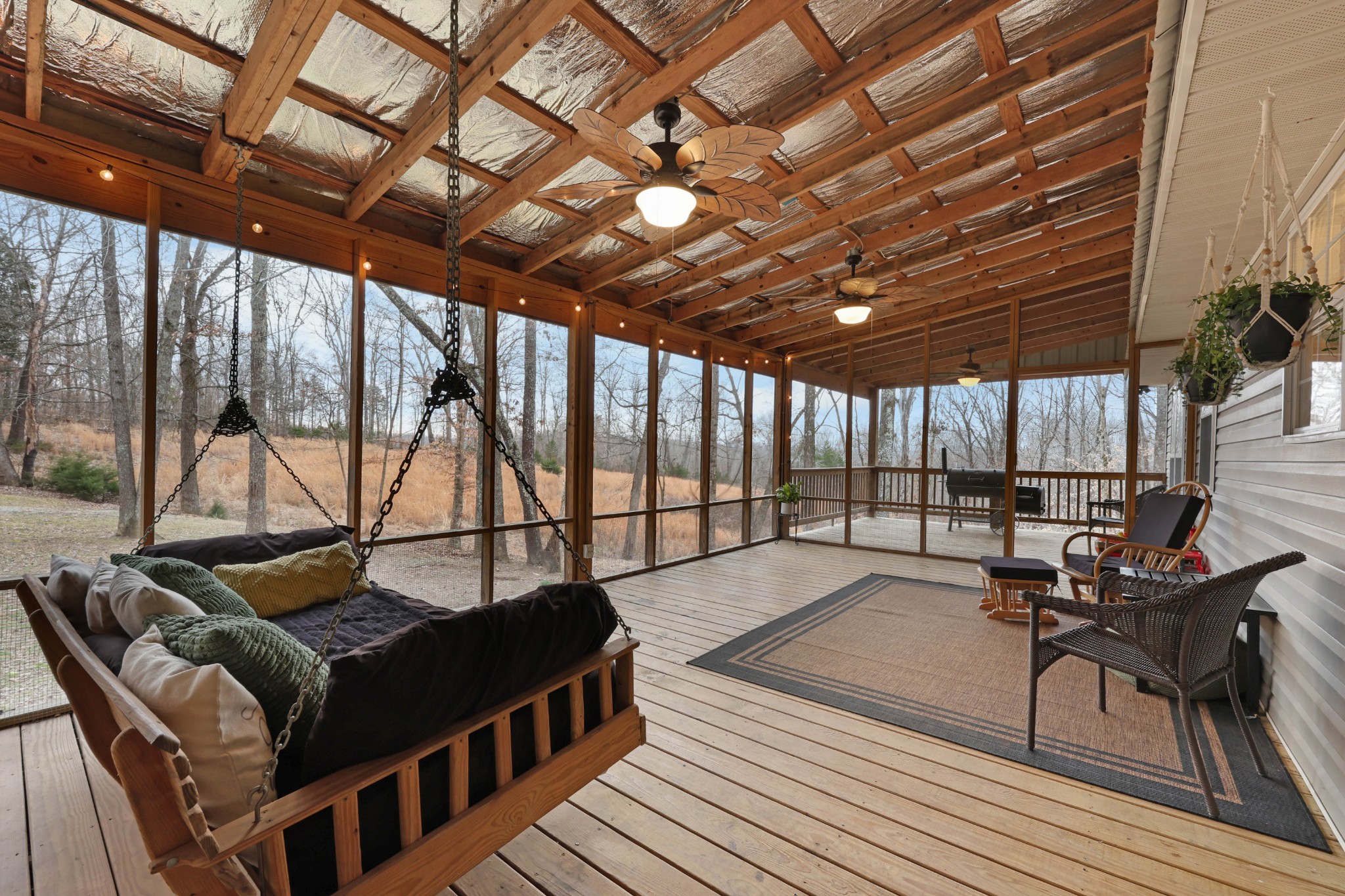 1201 Gallion Road Cumberland Furnace, TN 37051 - Photo 18 of 29 a living room with furniture a wooden floor and iron gate