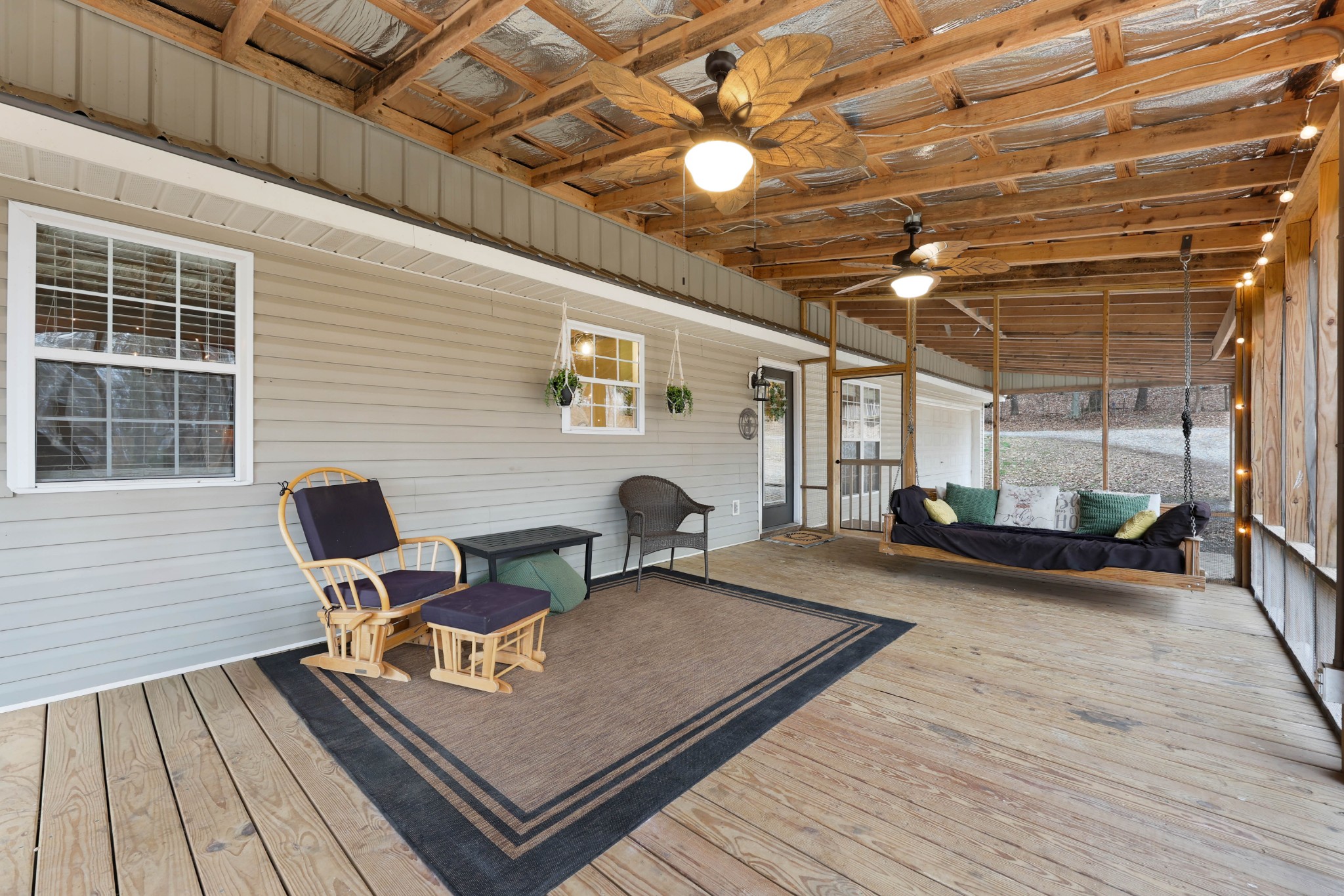 1201 Gallion Road Cumberland Furnace, TN 37051 - Photo 19 of 29 a view of a patio with a table and chairs