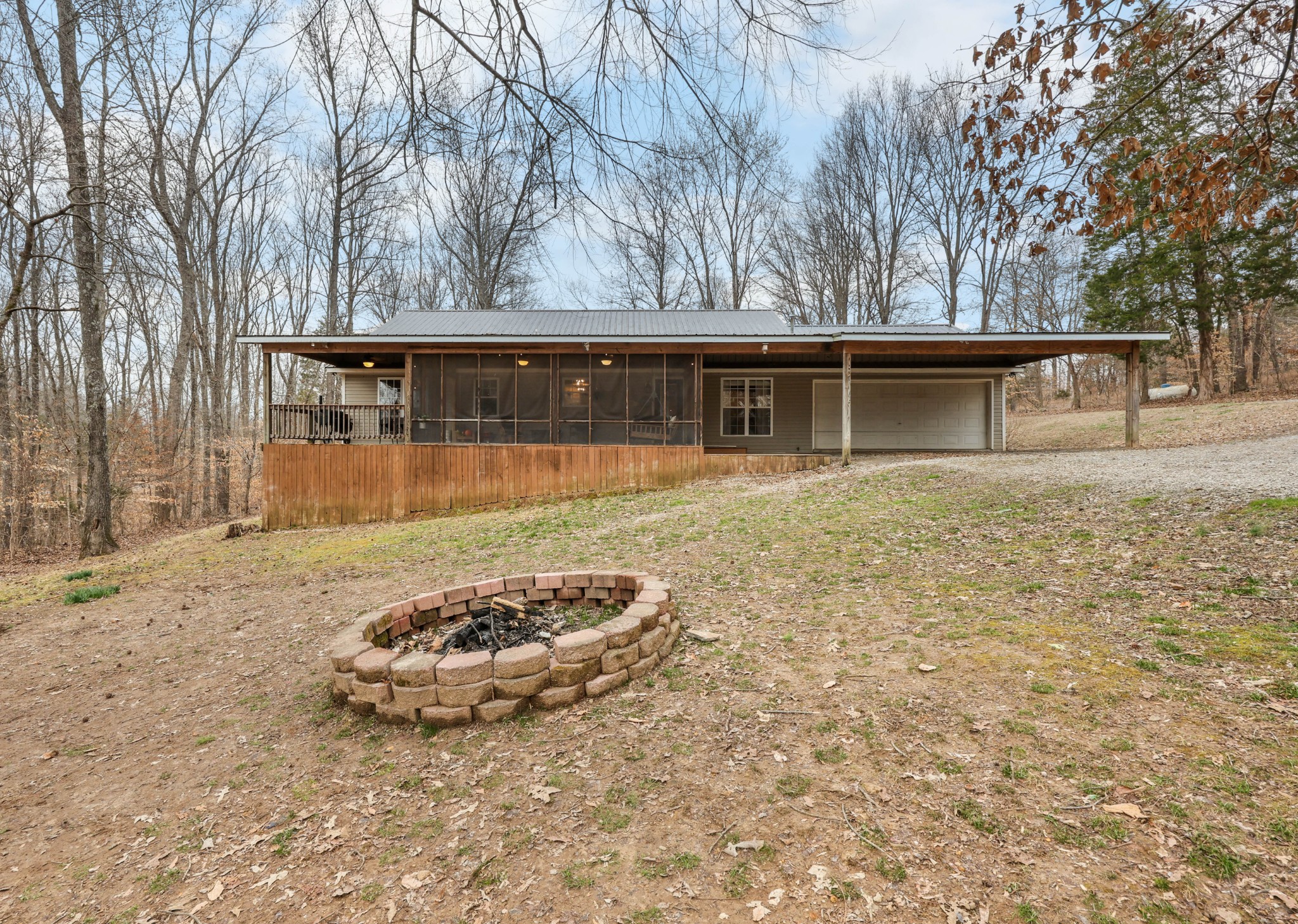 1201 Gallion Road Cumberland Furnace, TN 37051 - Photo 22 of 29 a front view of a house with a yard